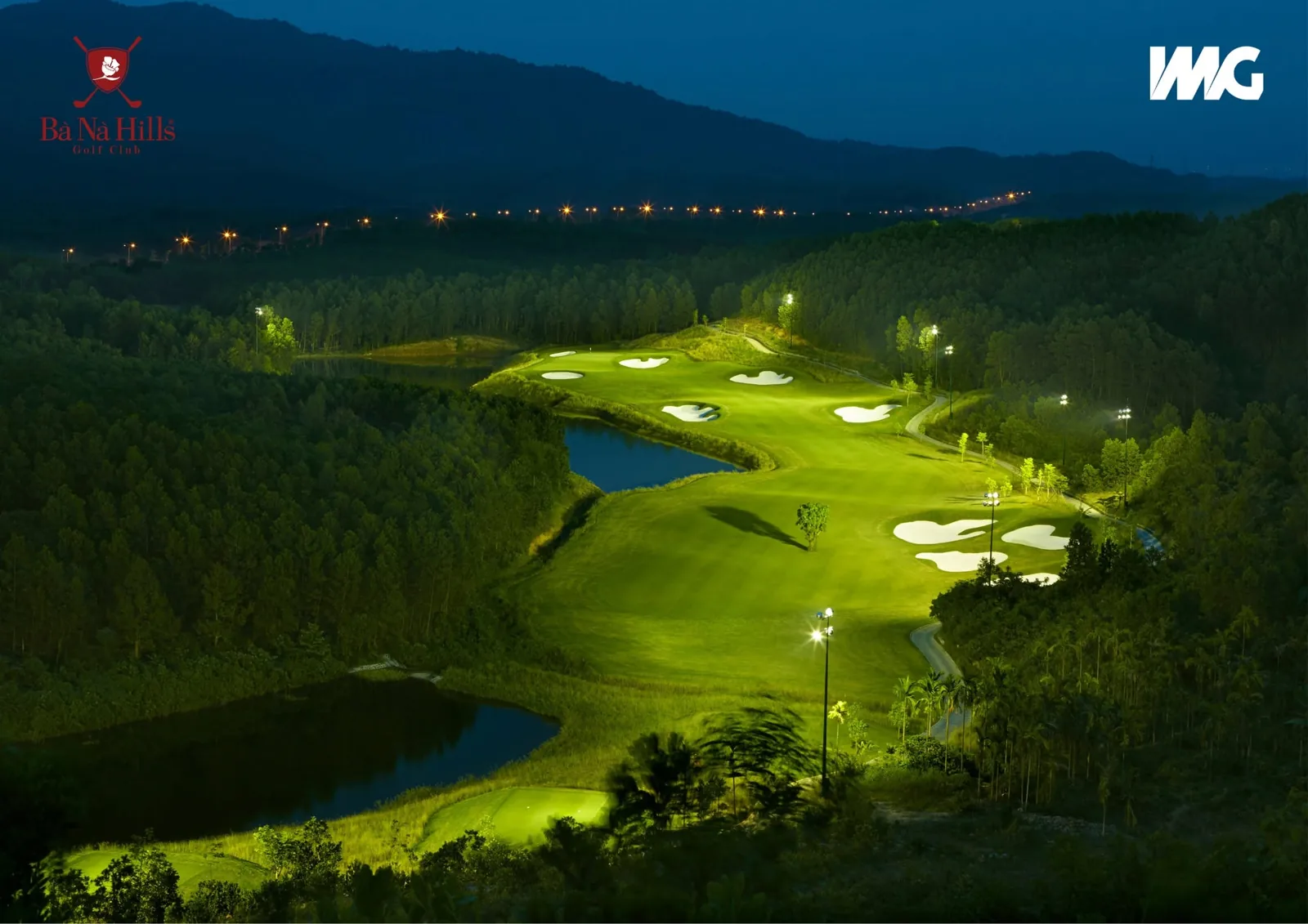 Floodlit fairway and bunkers at Ba Na Hills Golf Club in Da Nang after dark